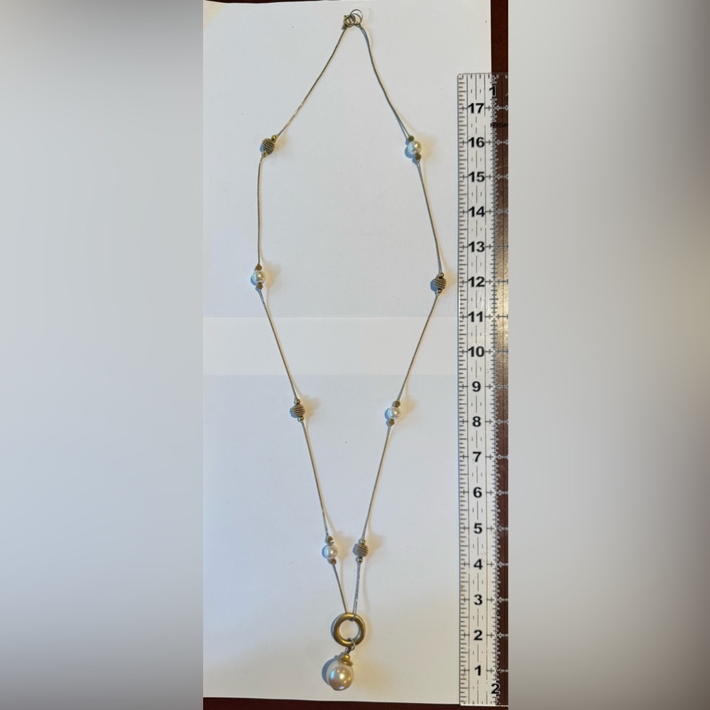 Elegant Gold and Silver Beaded Necklace